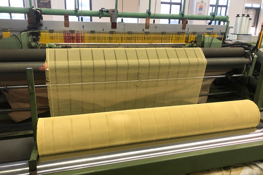 Rollo de tejido de malla reforzado con aramida de alta resistencia – para materiales básicos compuestos